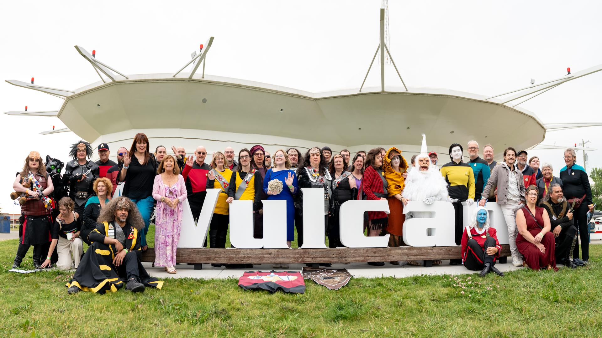 VulCON group standing with Vulcan sign.